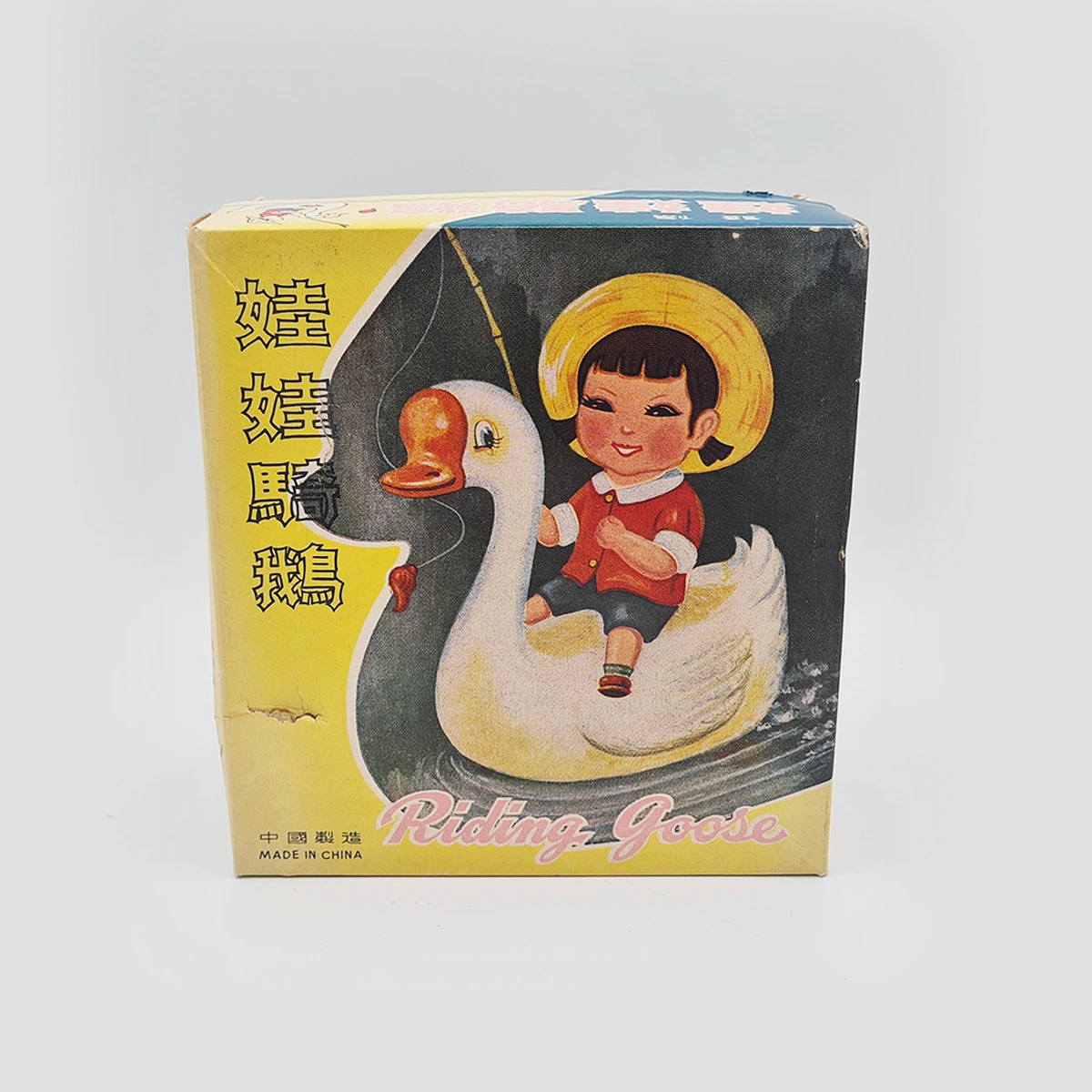 Boy Riding Goose Wind-up Toy