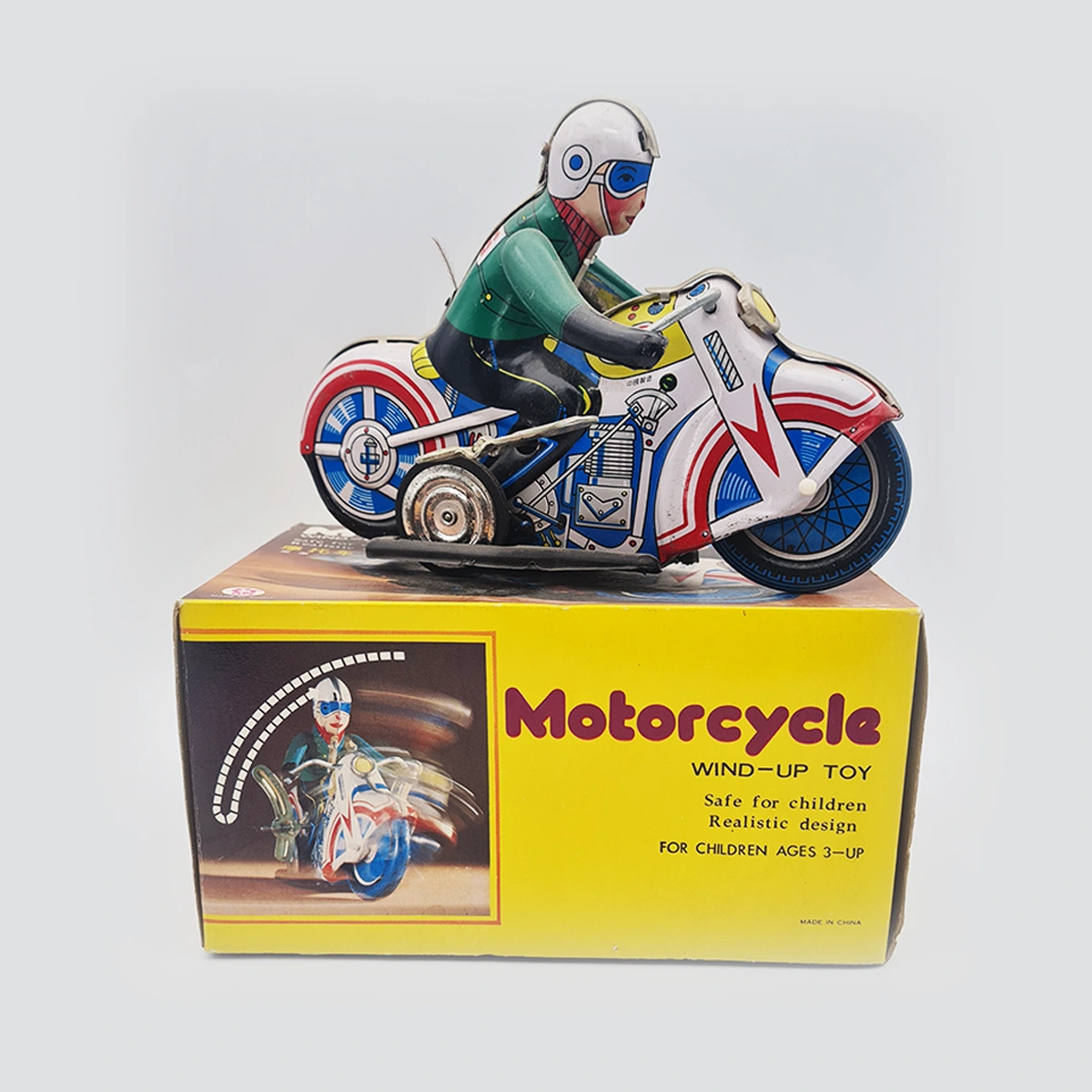 Motorcycle Rider Wind Up Tin Toy