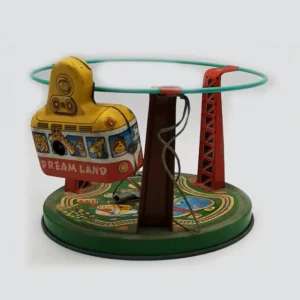 A close-up of a vintage Japanese tin toy robot with distinct lithography and a clear maker's mark.